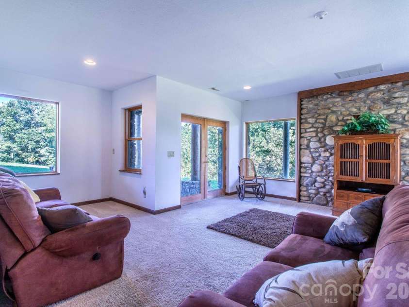 891 Logans Ridge Road, Marshall, NC 28753.  MLS# CAR4411143, YatesRealty ID 49403. Lower level den