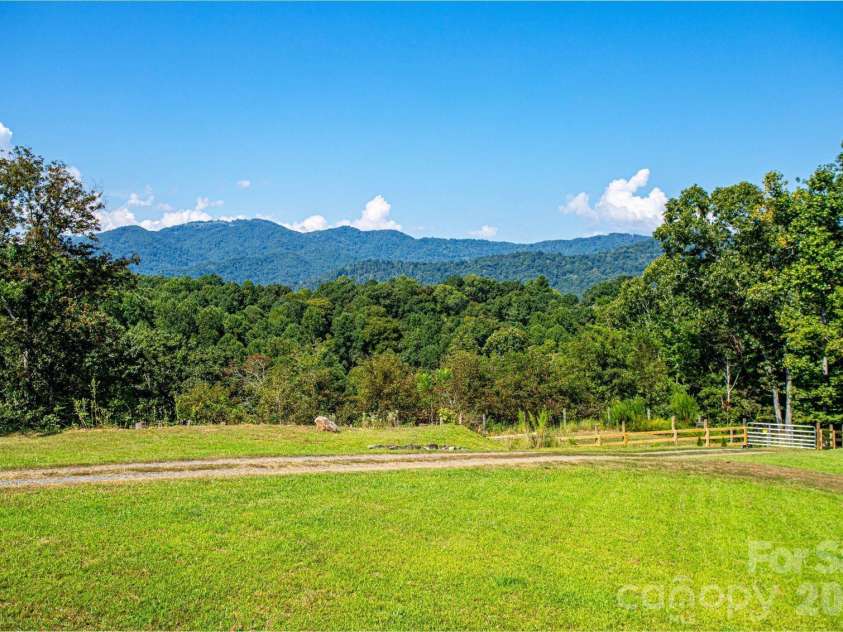891 Logans Ridge Road, Marshall, NC 28753.  MLS# CAR4411143, YatesRealty ID 49403. Outstanding views and flat land to enjoy