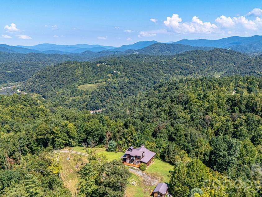 891 Logans Ridge Road, Marshall, NC 28753.  MLS# CAR4411143, YatesRealty ID 49403. Perched on a knoll with privacy