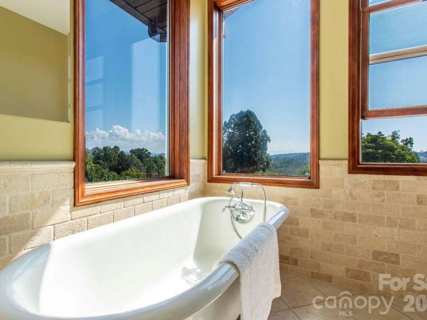 891 Logans Ridge Road, Marshall, NC 28753.  MLS# CAR4411143, YatesRealty ID 49403. Primary bath on upper level