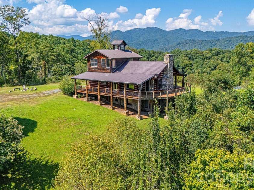 891 Logans Ridge Road, Marshall, NC 28753.  MLS# CAR4411143, YatesRealty ID 49403. Total privacy up on the knoll