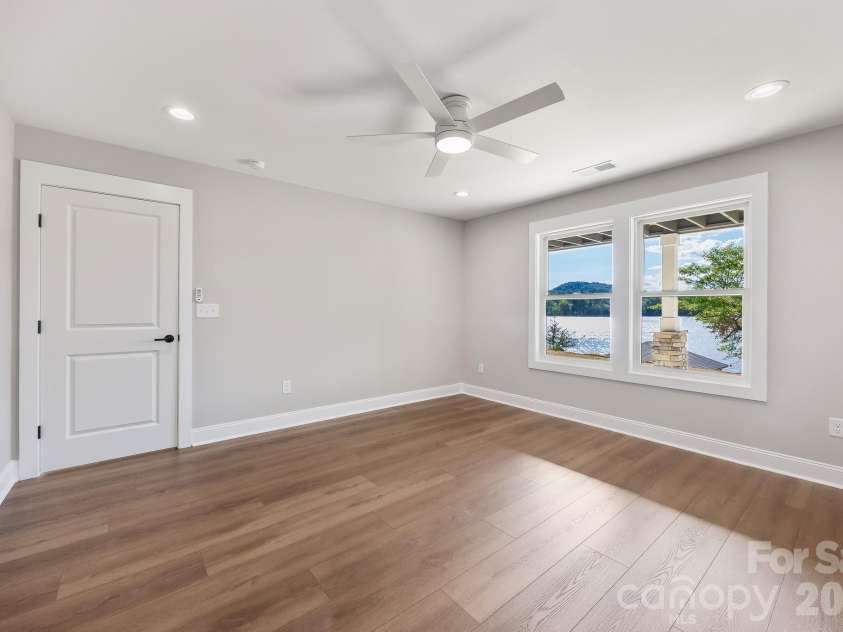 200 Ridge Road, Troy, NC 27371.  MLS# CAR4422497, YatesRealty ID 49417. Basement Bedroom 1