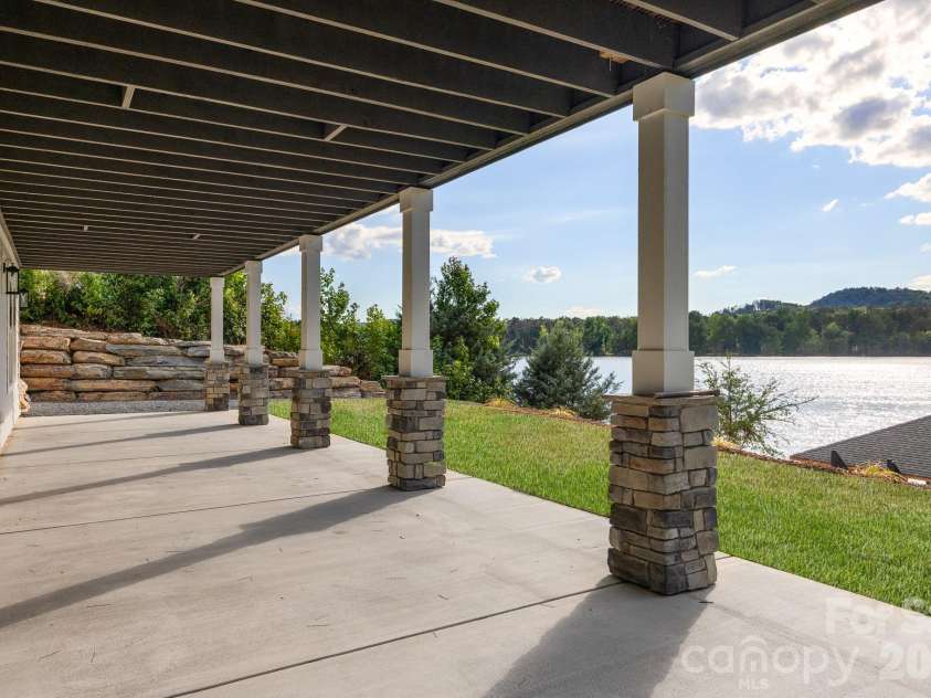 200 Ridge Road, Troy, NC 27371.  MLS# CAR4422497, YatesRealty ID 49417. Basement patio