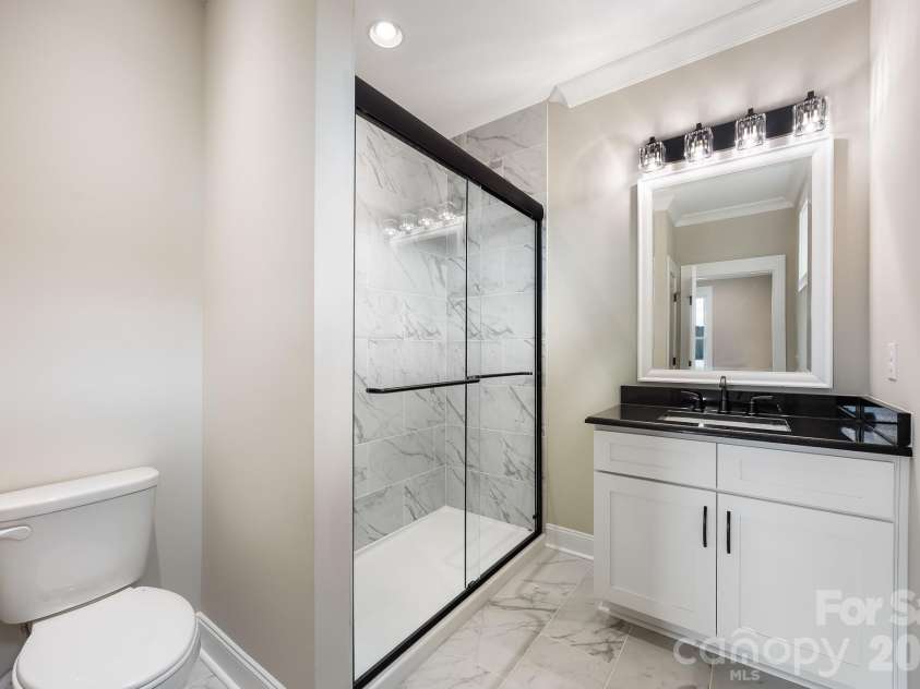 200 Ridge Road, Troy, NC 27371.  MLS# CAR4422497, YatesRealty ID 49417. Bathroom