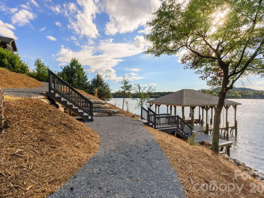 200 Ridge Road, Troy, NC 27371.  MLS# CAR4422497, YatesRealty ID 49417. Cart path to Dock