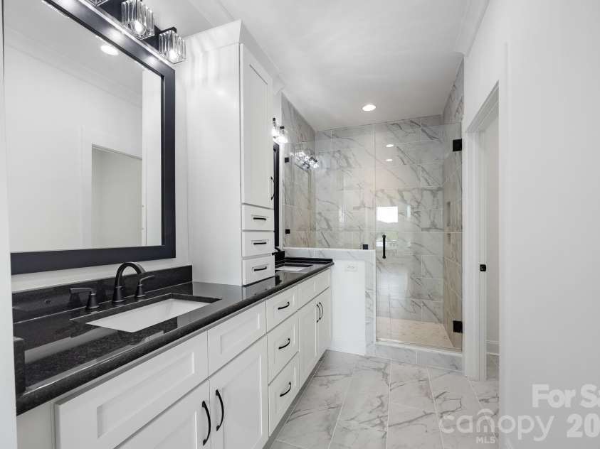 200 Ridge Road, Troy, NC 27371.  MLS# CAR4422497, YatesRealty ID 49417. Primary Bathroom