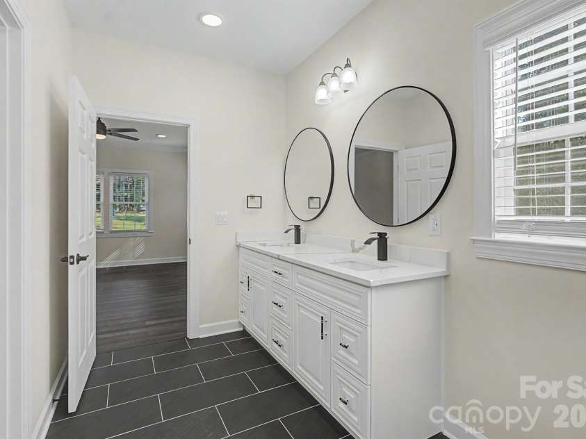112 Jimmy Street, Candor, NC 27229.  MLS# CAR4422559, YatesRealty ID 49436. Master Bath