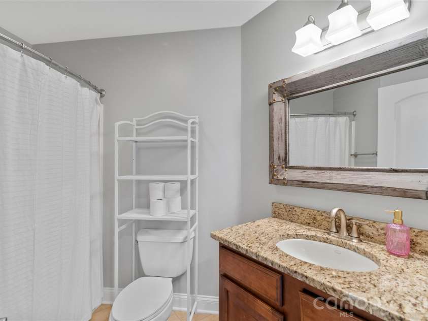 160 Fairway Falls Road, Mills River, NC 28759.  MLS# CAR4353536, YatesRealty ID 4944. Upper level guest full bath with Granite sink 
