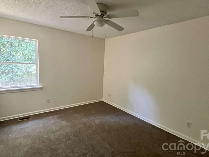 828 Cornelius Road, Mooresville, NC 28117.  MLS# CAR4422565, YatesRealty ID 49440. Bedroom 1