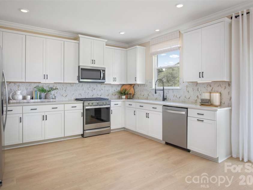 1819 Quiet Woods Road, Monroe, NC 28110.  MLS# CAR4422627, YatesRealty ID 49459. Representation Photo from Model Home of plan - options/selections may vary on home available. Please confirm all selections with onsite Sales Counselor.