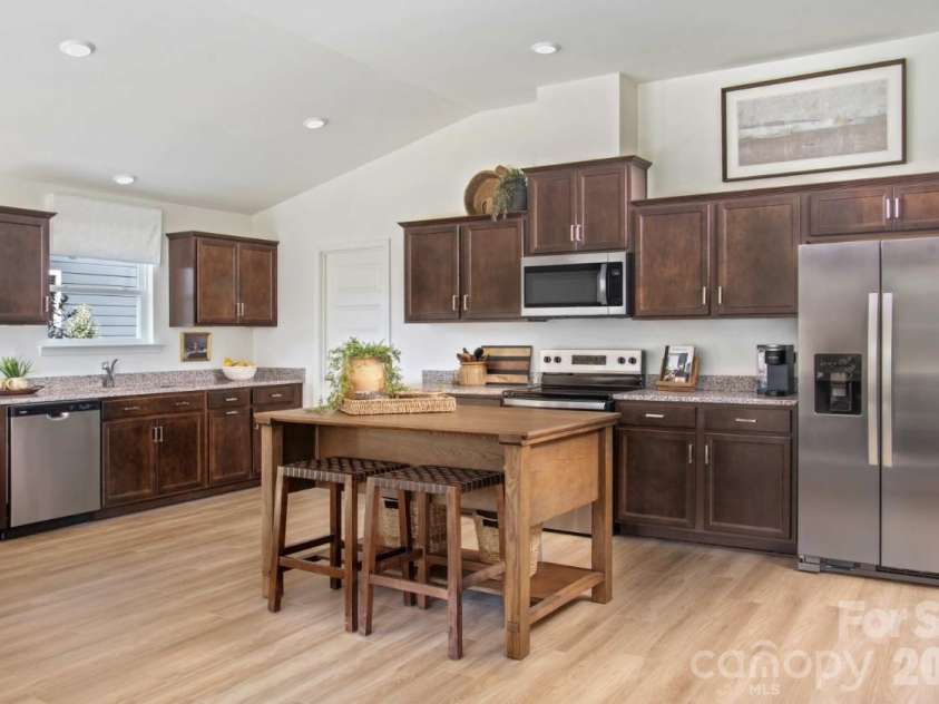 405 Creston Place Drive, Monroe, NC 28110.  MLS# CAR4422611, YatesRealty ID 49460. Representative Photo From Model Home - selections/options may vary on home available. Please confirm all selections with onsite Sales Counselor.