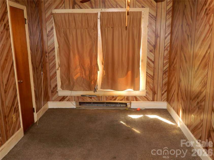 310 Reform Street, Lenoir, NC 28645.  MLS# CAR4422325, YatesRealty ID 49463. Bedroom 1