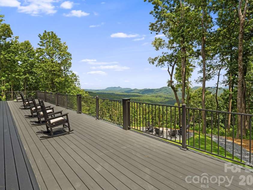 538 Pinnacle Mountain Preserve Road, Zirconia, NC 28790.  MLS# CAR4417464, YatesRealty ID 49488. Expansive Trex deck with stunning views