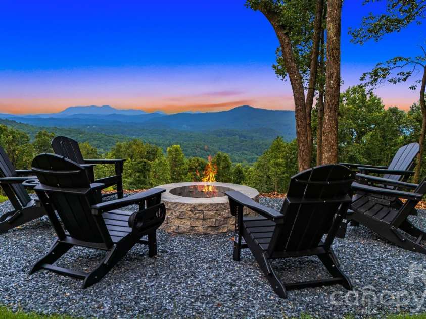 538 Pinnacle Mountain Preserve Road, Zirconia, NC 28790.  MLS# CAR4417464, YatesRealty ID 49488. Fire pit perfect for cool Fall evenings!
