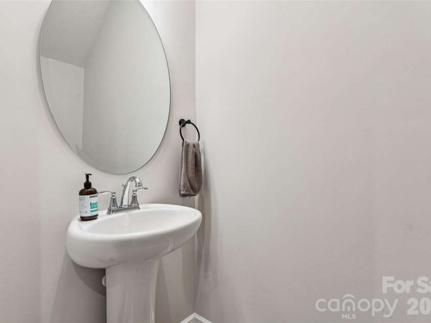 3132 Hutton Gardens Lane, Charlotte, NC 28269.  MLS# CAR4422591, YatesRealty ID 49489. Main level half bath