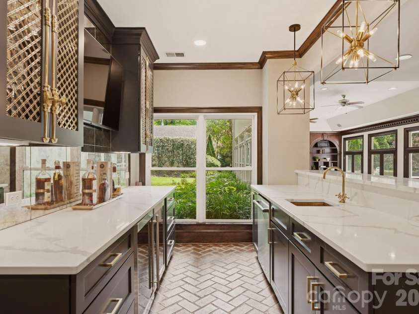 2611 Oakmeade Drive, Charlotte, NC 28270.  MLS# CAR4416855, YatesRealty ID 49493. Basement kitchen