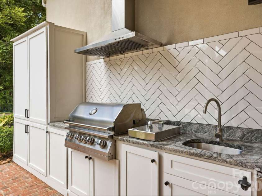 2611 Oakmeade Drive, Charlotte, NC 28270.  MLS# CAR4416855, YatesRealty ID 49493. Outdoor kitchen