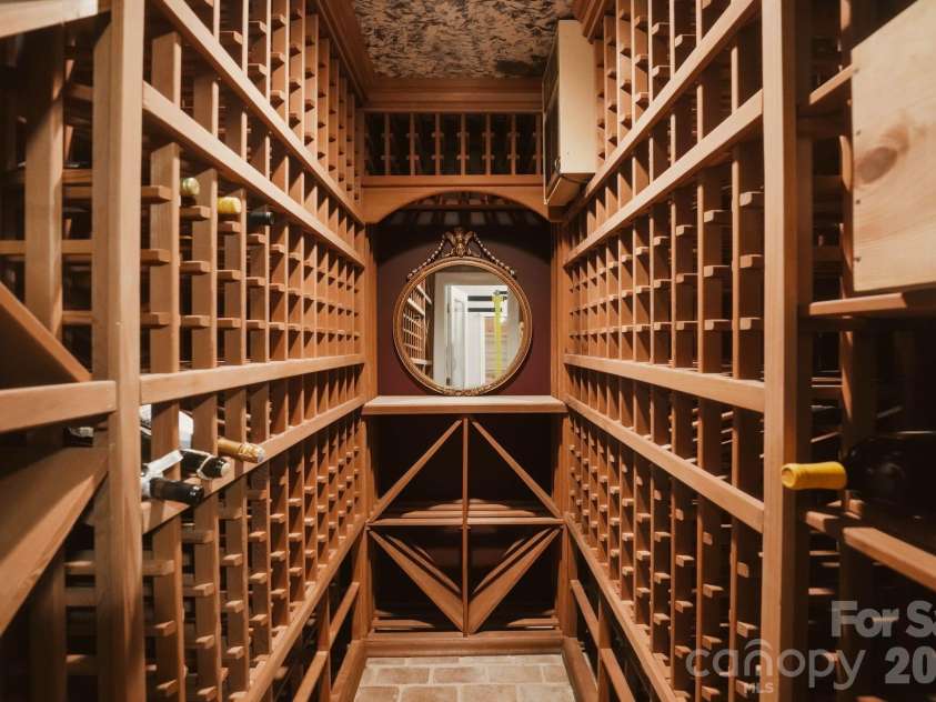 2611 Oakmeade Drive, Charlotte, NC 28270.  MLS# CAR4416855, YatesRealty ID 49493. Wine cellar