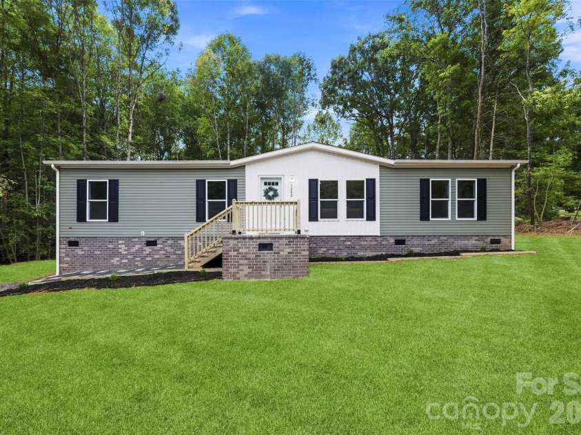 1280 Forest Ridge Road, Bessemer City, NC 28016.  MLS# CAR4422357, YatesRealty ID 49495. Grass is virtually staged