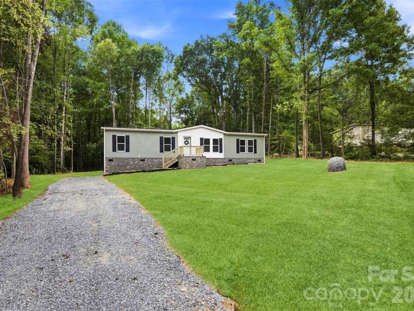 1280 Forest Ridge Road, Bessemer City, NC 28016.  MLS# CAR4422357, YatesRealty ID 49495. Grass is virtually staged