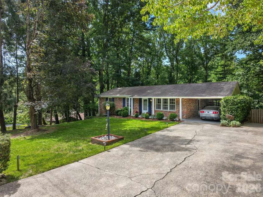 921 Indian Hill Road, Hendersonville, NC 28791.  MLS# CAR4421924, YatesRealty ID 49496. 