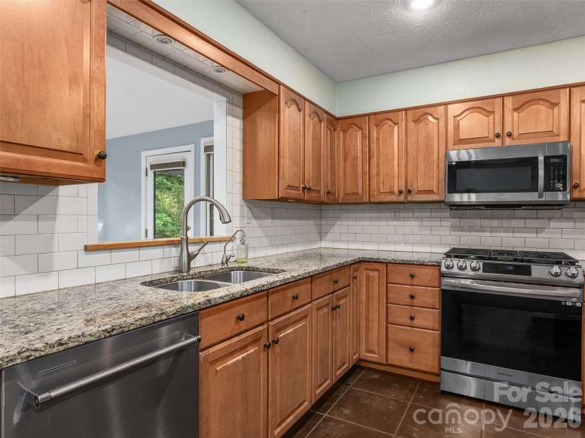921 Indian Hill Road, Hendersonville, NC 28791.  MLS# CAR4421924, YatesRealty ID 49496. 