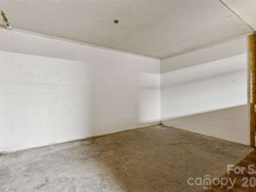 227/229 Pethel Street, Kannapolis, NC 28081.  MLS# CAR4418623, YatesRealty ID 49498. Garage beneath 227 Pethel