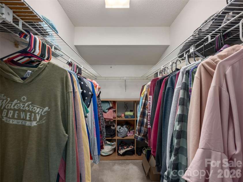 5 St Andrews Drive, Etowah, NC 28729.  MLS# CAR4419907, YatesRealty ID 49514. Generously sized closet provides excellent storage for the primary bedroom.