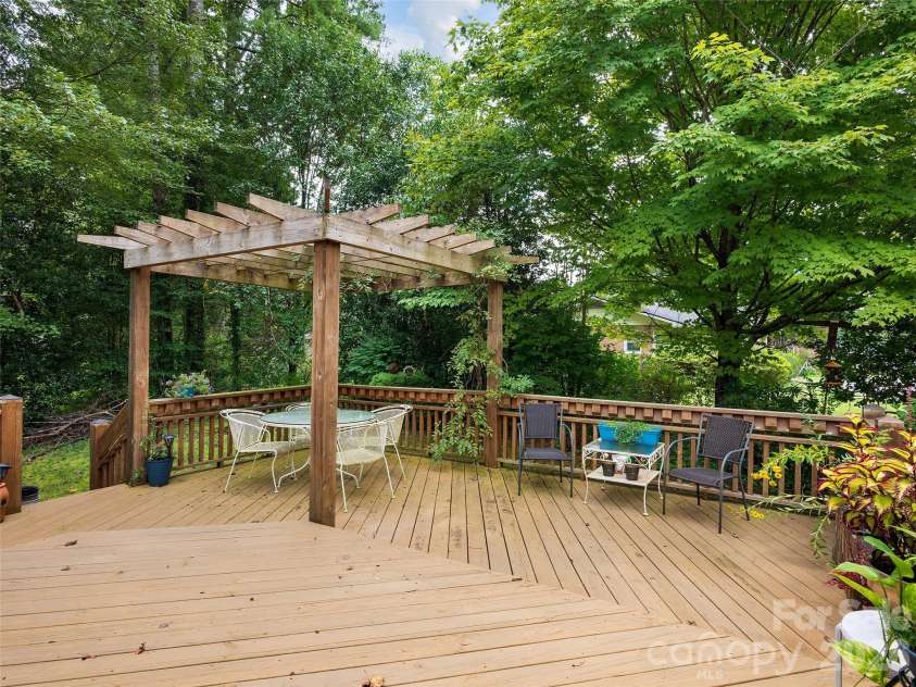 5 St Andrews Drive, Etowah, NC 28729.  MLS# CAR4419907, YatesRealty ID 49514. Large rear deck creates additional outdoor living and entertaining space