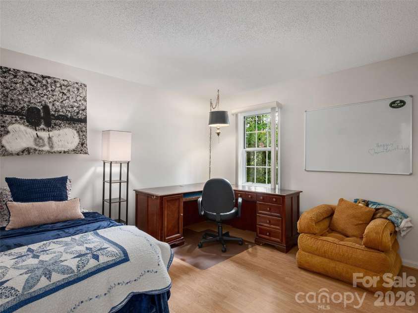 5 St Andrews Drive, Etowah, NC 28729.  MLS# CAR4419907, YatesRealty ID 49514. Third bedroom offers flexible space for guests, a home office, hobbies, or additional living needs.