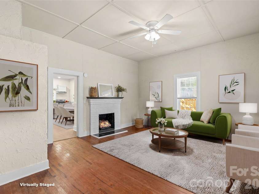 209 Wilson Avenue, Mooresville, NC 28115.  MLS# CAR4422376, YatesRealty ID 49527. Great Room is virtually staged