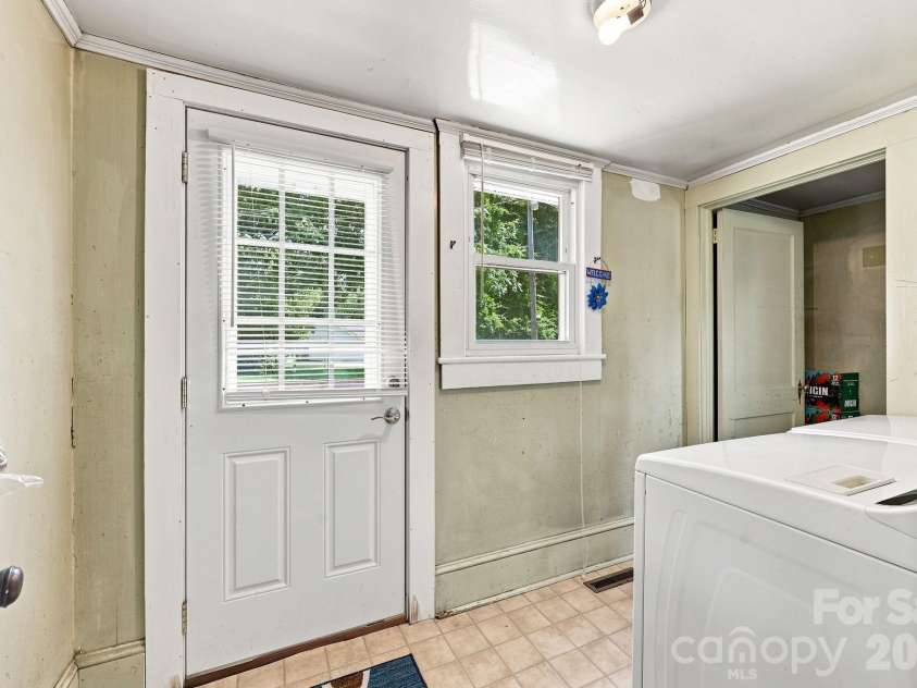 313 Ridge Avenue, Kannapolis, NC 28083.  MLS# CAR4405624, YatesRealty ID 49529. Laundry Room and Backdoor