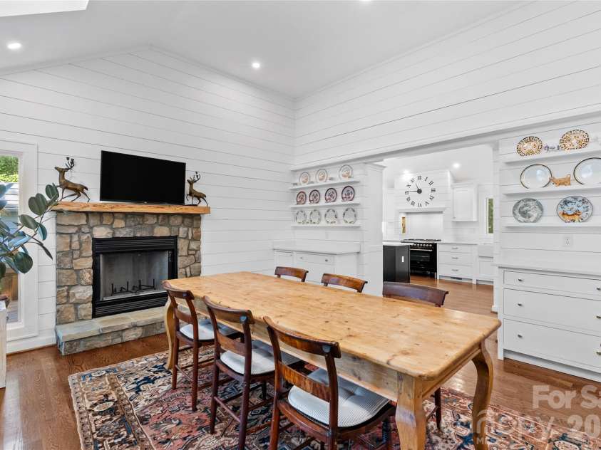 566 Canebrake Road, Tryon, NC 28782.  MLS# CAR4299420, YatesRealty ID 4954. Another view of the dining room. Great built-ins make this space even more special.