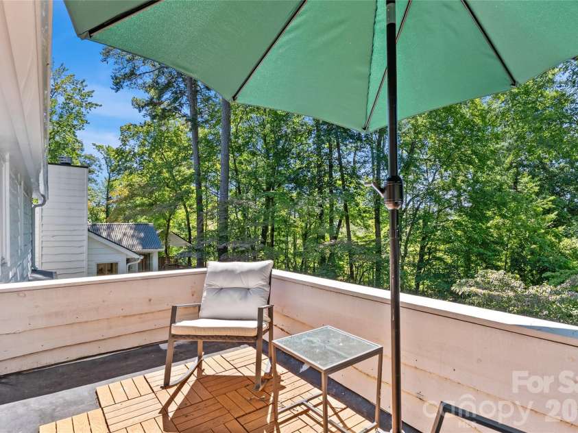 566 Canebrake Road, Tryon, NC 28782.  MLS# CAR4299420, YatesRealty ID 4954. Balcony off of the studio!