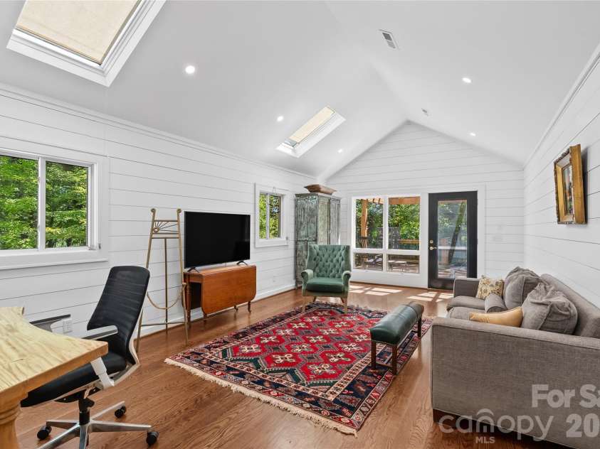 566 Canebrake Road, Tryon, NC 28782.  MLS# CAR4299420, YatesRealty ID 4954. Huge new addition with it's own entry has same gorgeous floors and attention to detail.