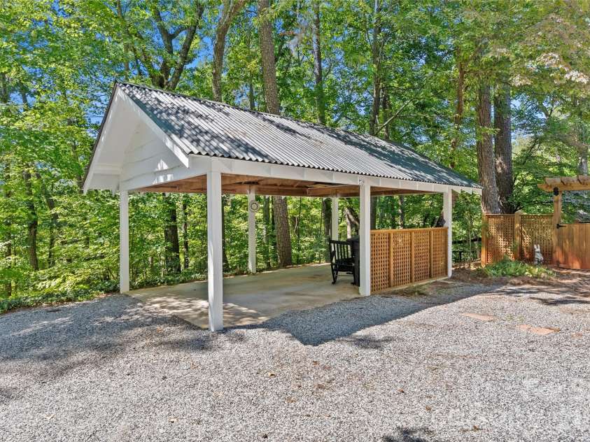 566 Canebrake Road, Tryon, NC 28782.  MLS# CAR4299420, YatesRealty ID 4954. New carport. 
