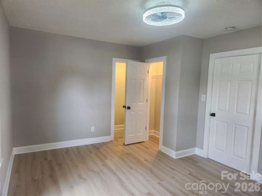 8 summit Avenue, Granite Falls, NC 28630.  MLS# CAR4422269, YatesRealty ID 49545. Front Bedroom/closet & Half Bath