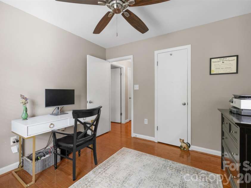 11714 Painted Tree Road, Charlotte, NC 28226.  MLS# CAR4421216, YatesRealty ID 49549. 3rd bedroom/ office with ceiling fan and another walk-in closet!