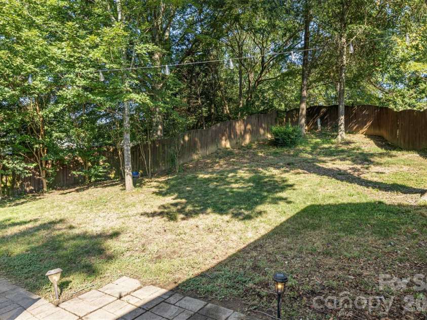 11714 Painted Tree Road, Charlotte, NC 28226.  MLS# CAR4421216, YatesRealty ID 49549. Enjoy morning coffee or evening drinks on your private patio!