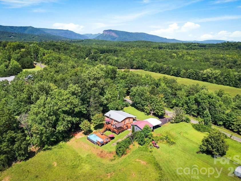 7693 Mountain Institute Road, Nebo, NC 28761.  MLS# CAR4418624, YatesRealty ID 49560. 