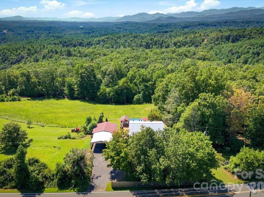 7693 Mountain Institute Road, Nebo, NC 28761.  MLS# CAR4418624, YatesRealty ID 49560. 