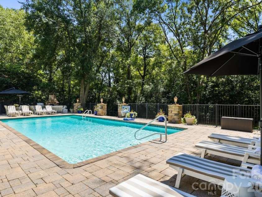 4234 Rotunda Road, Charlotte, NC 28226.  MLS# CAR4419685, YatesRealty ID 49567. Expansive pool and sunbathing area. Perfect for backyard entertaining