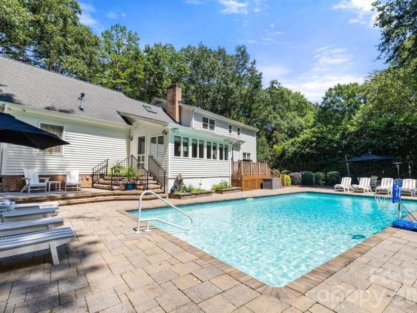 4234 Rotunda Road, Charlotte, NC 28226.  MLS# CAR4419685, YatesRealty ID 49567. Expansive pool area for sunbathing and entertaining.