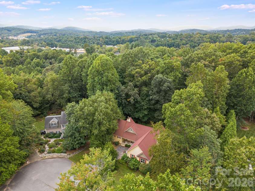 312 Forest Place, Candler, NC 28715.  MLS# CAR4419930, YatesRealty ID 49569. 