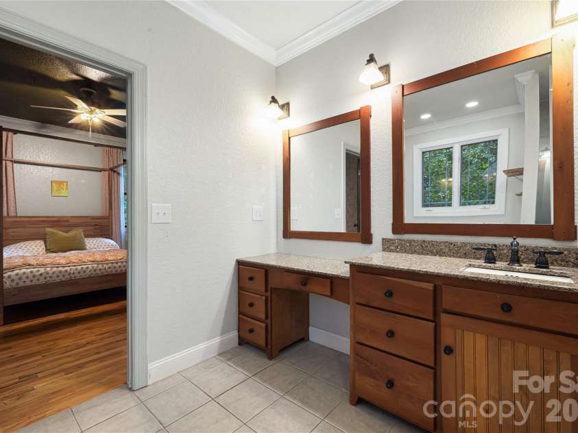 312 Forest Place, Candler, NC 28715.  MLS# CAR4419930, YatesRealty ID 49569. 