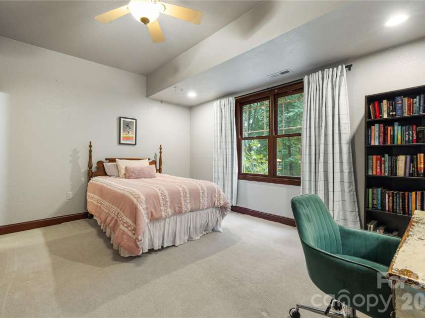 312 Forest Place, Candler, NC 28715.  MLS# CAR4419930, YatesRealty ID 49569. Downstairs bedroom 1.