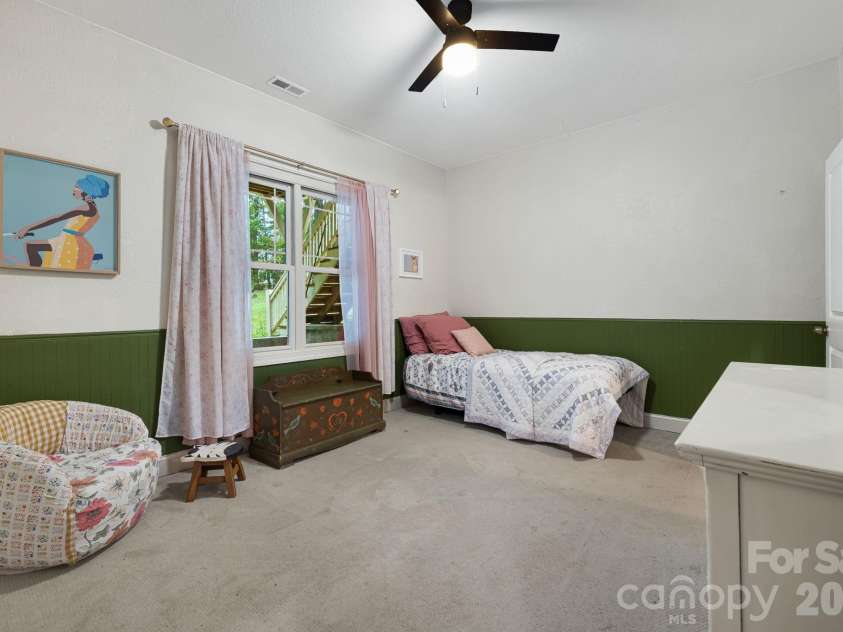 312 Forest Place, Candler, NC 28715.  MLS# CAR4419930, YatesRealty ID 49569. Downstairs bedroom 3.