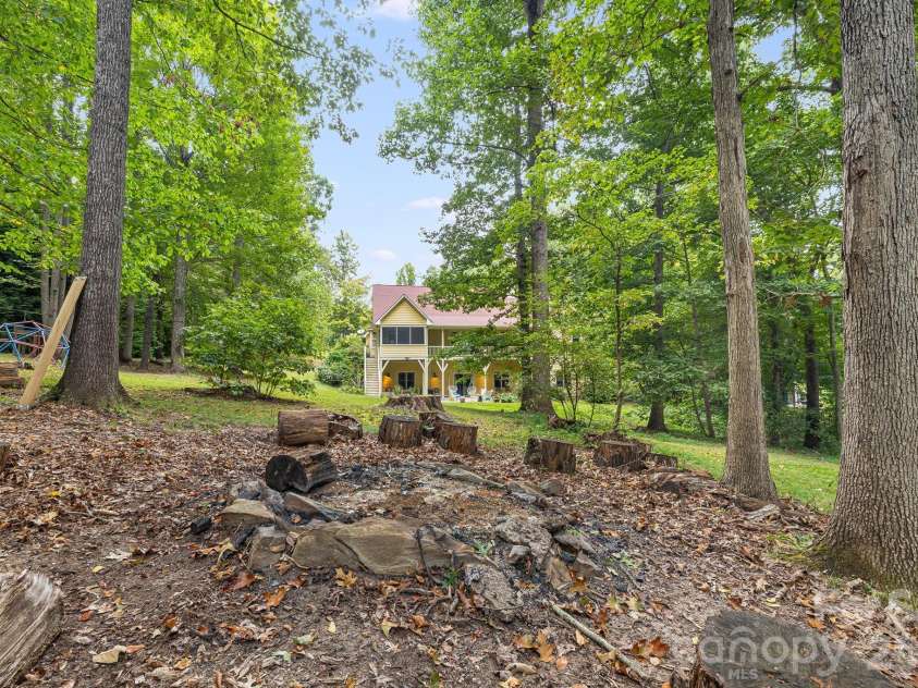 312 Forest Place, Candler, NC 28715.  MLS# CAR4419930, YatesRealty ID 49569. Fire pit.
