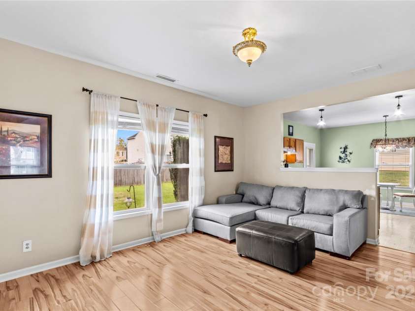 120 Vermillion Loop, Statesville, NC 28625.  MLS# CAR4243464, YatesRealty ID 4957. Great room looking into kitchen