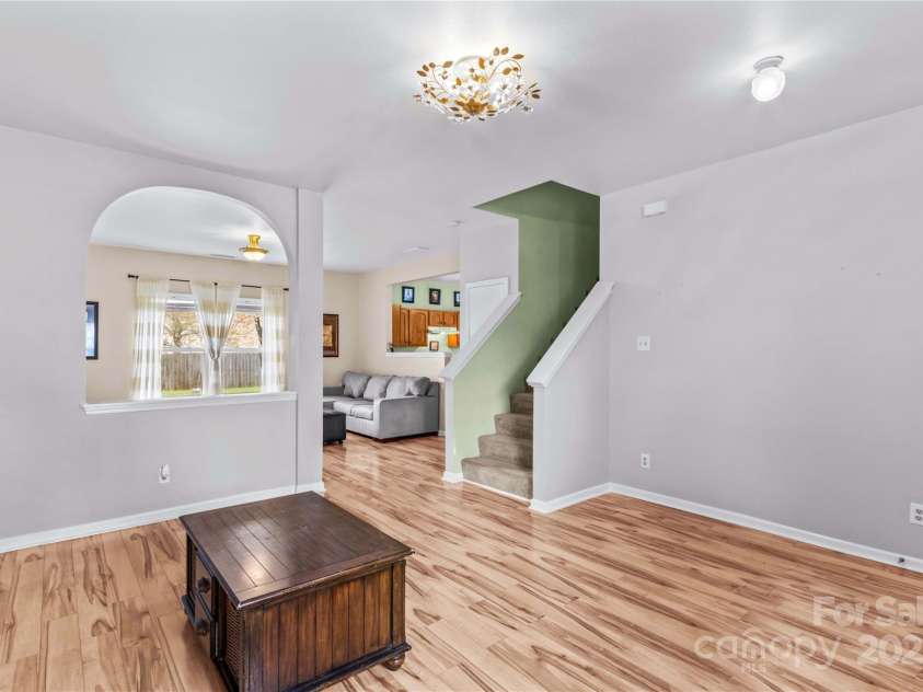 120 Vermillion Loop, Statesville, NC 28625.  MLS# CAR4243464, YatesRealty ID 4957. Living room looking into great room